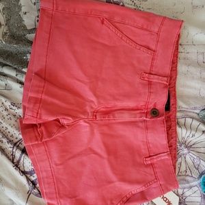 A pair of new pink shorts